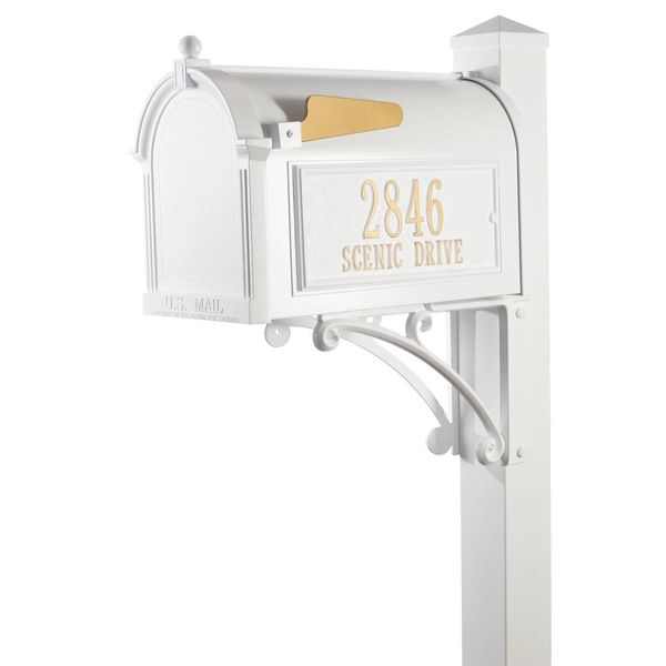 A white mailbox with a yellow letter on it.