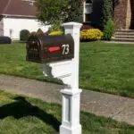 A mailbox in front of a house.