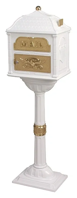 A Gaines Classic Mailbox With Polished Brass Accent - Installation Included on a pedestal.